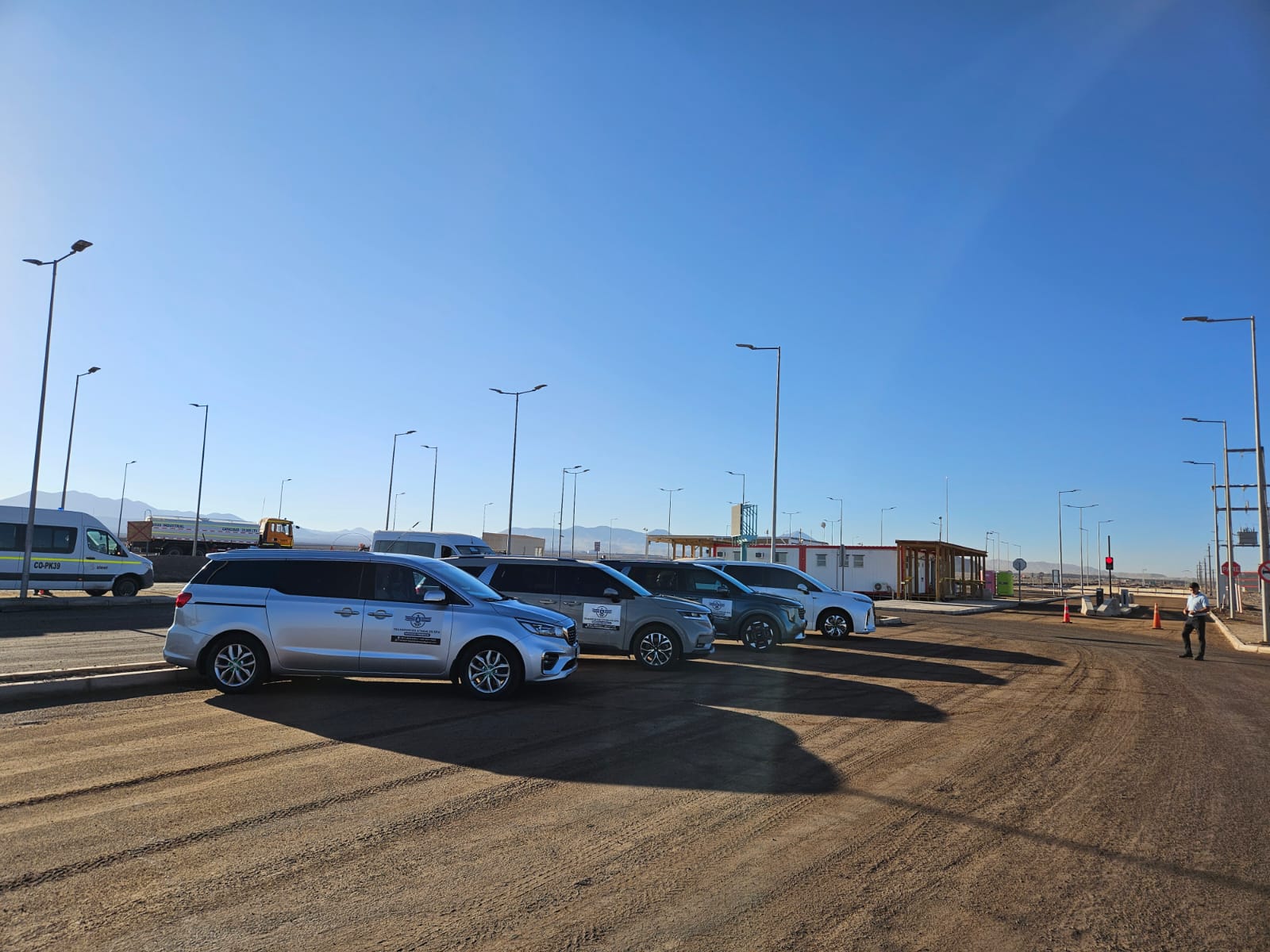 Professional ATABALES driver with a modern company vehicle